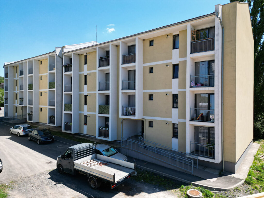 Residential block, Șomcuta Mare, Romania — façade with balconies