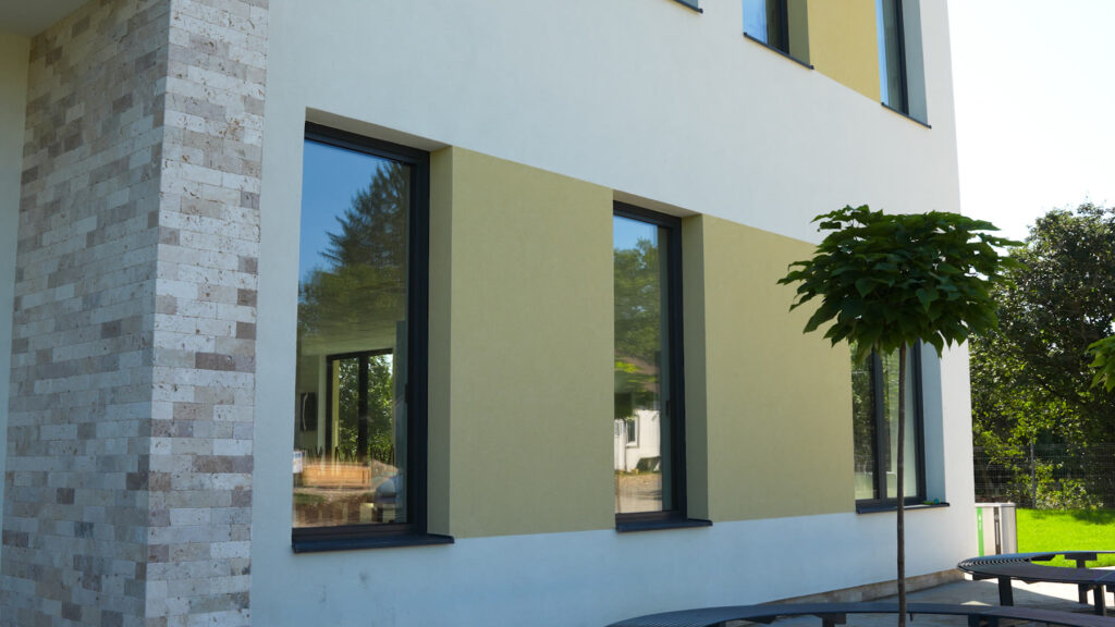 Day centre, Șomcuta Mare, Romania — façade detail